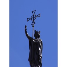 Statue of St Helena holding an elevated solar cross